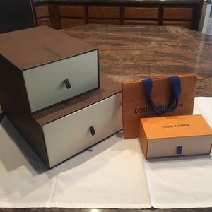 mpty shoe boxes LV and Brioni, home